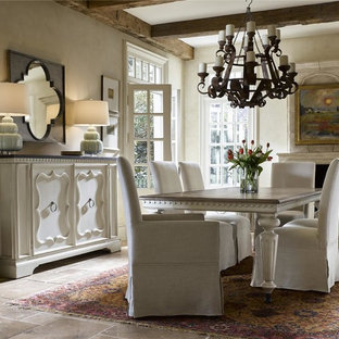 Large traditional open plan dining in Tampa with beige walls and beige floor.