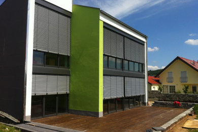 This is an example of a contemporary house exterior in Other.