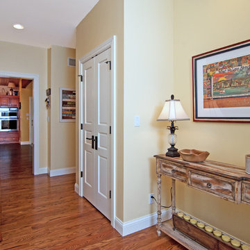 Lodge Look Makeover with Master Bedroom and Garage Addition in Wooded Setting
