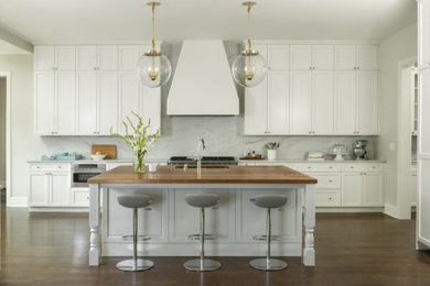 Example of a transitional kitchen design in Denver