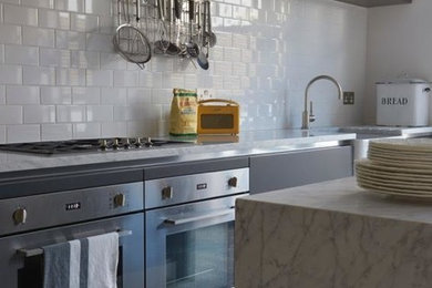 Contemporary single-wall open plan kitchen in London.