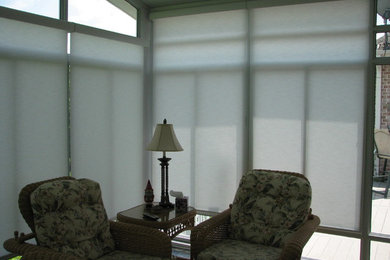 Mid-sized mountain style concrete floor sunroom photo in Nashville with a standard ceiling