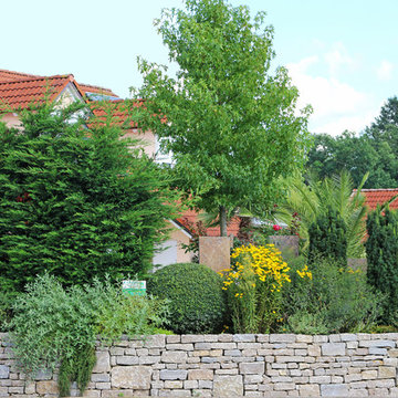 Garten mit Urlaubsflair und Koiteich