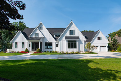 Example of a transitional exterior home design in Grand Rapids