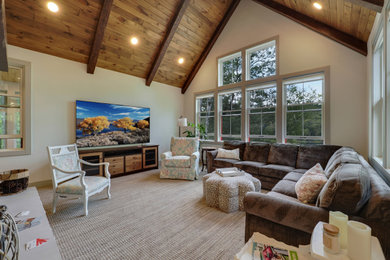 Example of a large enclosed medium tone wood floor living room design in Other with a standard fireplace and a stone fireplace