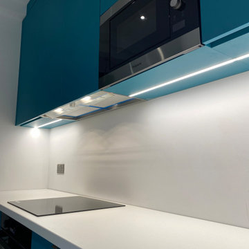 Teal & White Bespoke Kitchen with Feature Wall – London E6