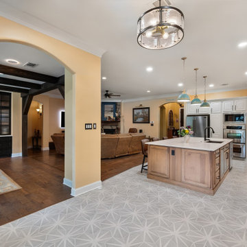 Open Concept Kitchen White Quartz Island Leather Barstools Copper Range Hood