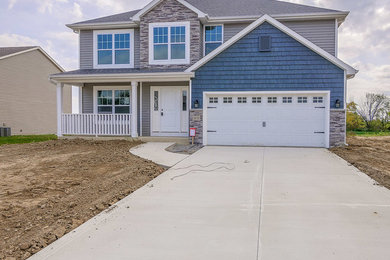Inspiration for a transitional exterior home remodel in Other