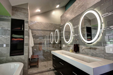 Mid-sized trendy master gray tile porcelain tile bathroom photo in Other with white walls, an integrated sink and concrete countertops