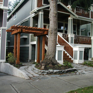 Small asian front yard partial sun formal garden in Seattle with a garden path and concrete pavers for winter.