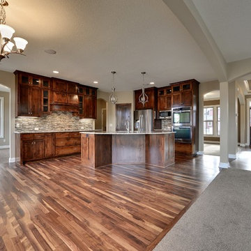 Architectural Designs Exclusive Plan 73352HS - Three Level Craftsman Beauty