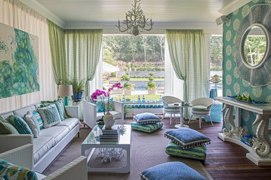 Inspiration for a coastal dark wood floor living room remodel in New York with blue walls