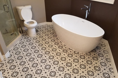 Example of a mid-sized tuscan bathroom design in Toronto