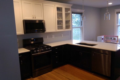 Kitchen photo in Cincinnati with shaker cabinets and white cabinets