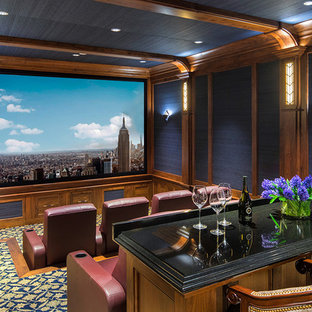 Inspiration for a classic enclosed home cinema in Indianapolis with blue walls, carpet, a projector screen and multi-coloured floors.