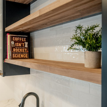 Open Shelving and Glass-Front Cabinetry with Textured Subway Tile