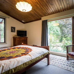 Bedroom uses Breezway Louvres next to fixed lite glass - Windows