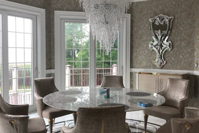 Example of a mid-sized trendy marble floor dining room design in New York with metallic walls
