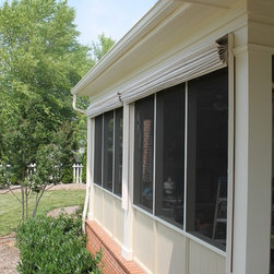 Screen porch shades form a soft valence - Roman Shades