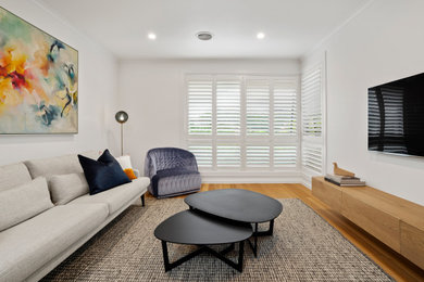 Photo of a contemporary living room in Melbourne.