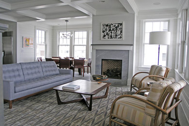 Inspiration for a mid-sized contemporary open concept medium tone wood floor living room remodel in New York with a stone fireplace, white walls, a standard fireplace and no tv