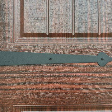 Builder Door transformed to a look of a Custom Woodgrain Door with Hardware