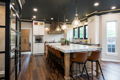 Eat-in kitchen - large contemporary eat-in kitchen idea in Cleveland with quartz countertops and an island