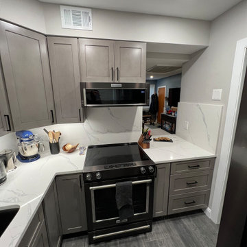 Modern Gray Kitchen Remodel with Quartz Surfaces