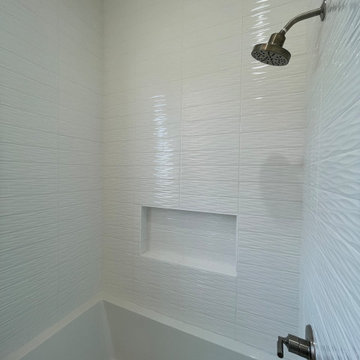 Tub Surround with 4x16 white ripple deco tiles