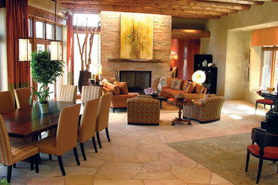 Example of a transitional home design design in Albuquerque