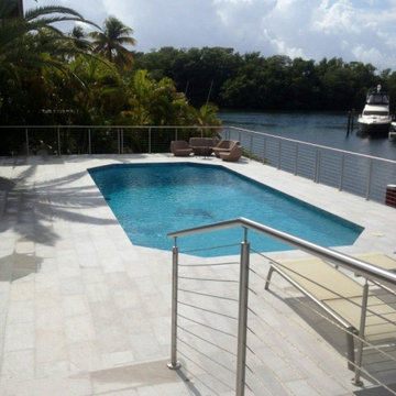 Pool deck with Snowhite Quartzite Floor and Wall Tiles