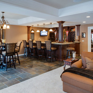Design ideas for a large classic look-out basement in Detroit with brown walls, slate flooring and no fireplace.