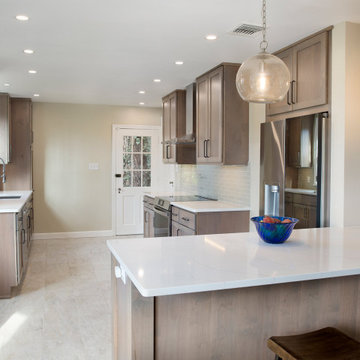 Warm Modern Transitional Kitchen| Natural Wood Cabinets, Quartz Peninsula