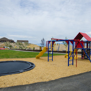 Photo of an expansive arts and crafts backyard full sun outdoor sport court for summer in Salt Lake City with concrete pavers.