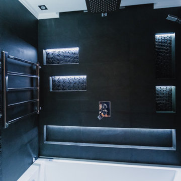 Trendy bathroom in dark color with LED lighting and sound system