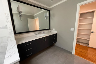 Small minimalist kids' white tile and marble tile single-sink bathroom photo in San Francisco with flat-panel cabinets, black cabinets, quartzite countertops, white countertops, a floating vanity, a bidet, a drop-in sink and gray walls