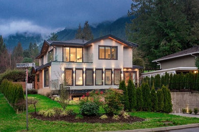 Example of a transitional exterior home design in Vancouver