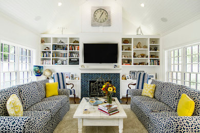 Mid-sized elegant medium tone wood floor family room photo in Dallas with white walls, a tile fireplace, a wall-mounted tv and a standard fireplace
