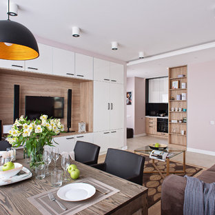 Foto di un piccolo soggiorno design aperto con angolo bar, pareti beige e parete attrezzata