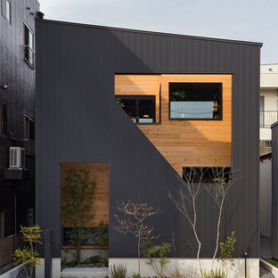 名古屋のコンテンポラリースタイルのおしゃれな家の外観 (黒い外壁) の写真