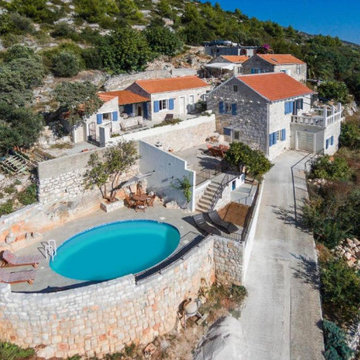 Restoration and conversion of stone house complex on Hvar island