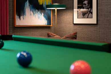 Inspiration for a large contemporary enclosed games room in London with a game room, grey walls, medium hardwood flooring, no fireplace, a wall mounted tv, brown floors, wallpapered walls and feature lighting.