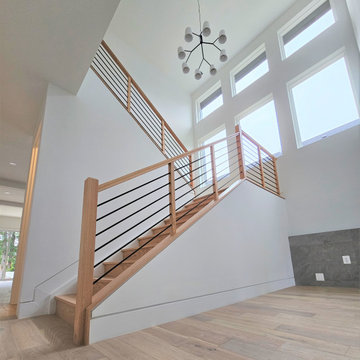 Project #108 | Red Oak Staircase in Light-Filled Space