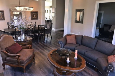 Inspiration for a large transitional open concept dark wood floor and gray floor family room remodel in San Francisco with gray walls