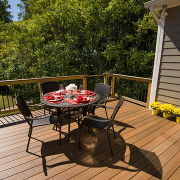 Composite deck above an open porch