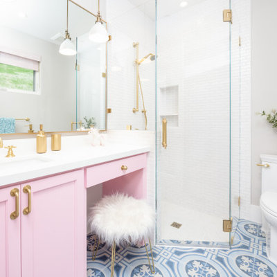 Mid-sized transitional kids' white tile and ceramic tile porcelain tile, blue floor and single-sink walk-in shower photo in San Francisco with shaker cabinets, purple cabinets, a one-piece toilet, beige walls, an undermount sink, quartz countertops, a hinged shower door, white countertops and a built-in vanity