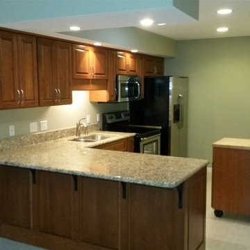 Kitchen Remodel done with Cabinet Refacing and New Cabinets