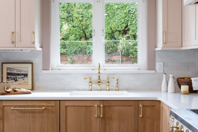 Inspiration for a small french country l-shaped kitchen remodel in Seattle with shaker cabinets, light wood cabinets and white appliances