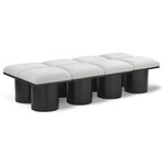 Meridian Furniture - Pavilion Black Boucle Fabric Bench, Cream, Black Finish, 72" W X 31" D X 17.5" H - Bring valuable seating and remarkable style to your space with this cream Pavilion Boucle Fabric Bench, an exquisite balance of style and usability for the entryway, bedroom, and beyond. Crafted from oak veneer with a black finish, this bench has a 4-inch-thick seat cushion that's channel-tufted for a touch of luxury. The bench's columnar bases add a dash of Art Deco design, making it a captivating focal point in any room.