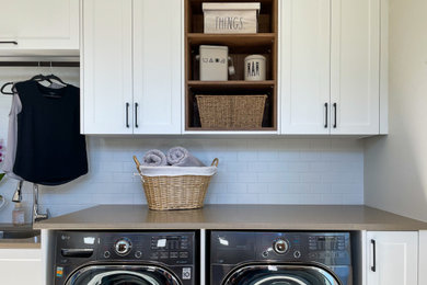 This is an example of a modern laundry room in Vancouver.